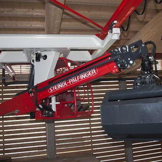 overhead slewing crane with wood chips grapple overhead slewing crane with wood chips grapple