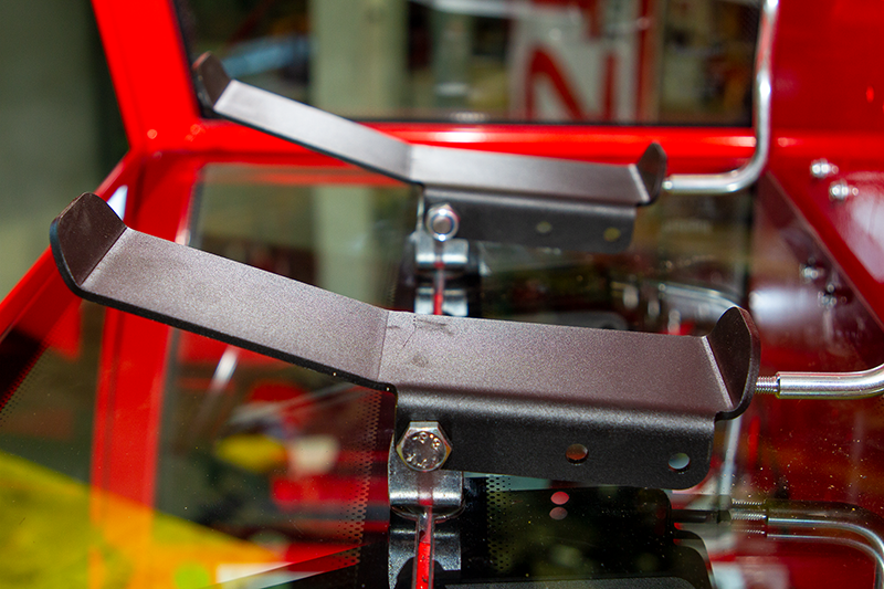 Glass floor and centrally arrange foot pedals with ball bearings